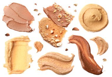 Fındık ezmesi. Beyaza izole edilmiş farklı örnekler, set. Üst görünüm