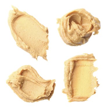 Fındık ezmesi nefis. Örnekler beyaza izole edildi. Üst görünüm