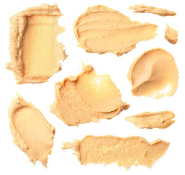 Fındık ezmesi nefis. Örnekler beyaza izole edildi. Üst görünüm