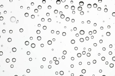Arka planda gaz kabarcıkları olan soda, yakın plan