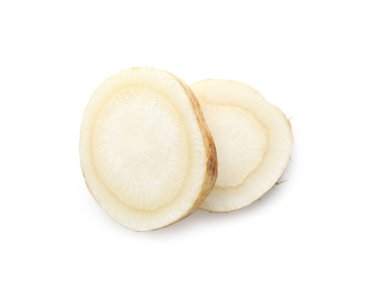 Beyaz renkte taze maydanoz kökü kes.