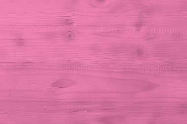 Texture of pink wooden surface as background, closeup