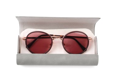 One grey case with sunglasses and lens cloth isolated on white, top view