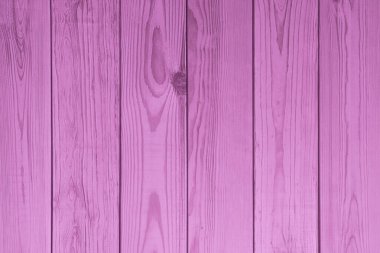 Arka plan olarak pembe ahşap kalasların dokusu, yakın plan