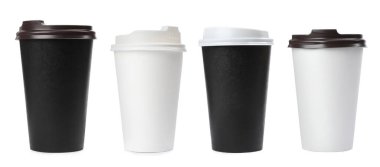 Different paper takeaway cups on white background, set