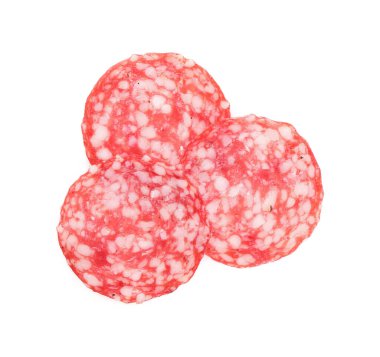 Slices of tasty smoked sausage on white background, top view