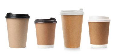 Different paper takeaway cups on white background, set