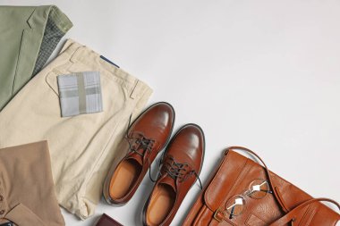 Elegant men's outfit. Stylish clothes, accessories and shoes on white background, flat lay. Space for text