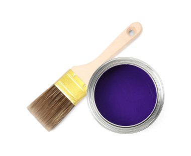 Can of purple paint and brush isolated on white, top view