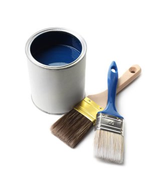 Can of blue paint and brushes isolated on white