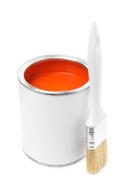 Can of orange paint and brush isolated on white