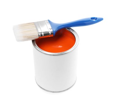 Can of orange paint and brush isolated on white