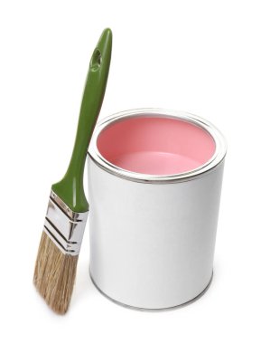 Can of pink paint and brush isolated on white