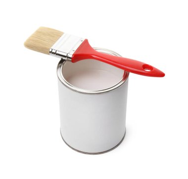 Open can of paint and brush isolated on white