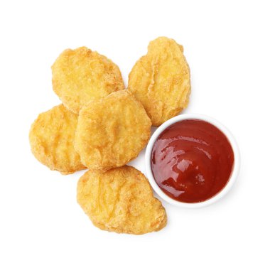Tasty chicken nuggets with sauce isolated on white, top view