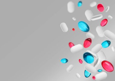 Many different pills flying on grey background, space for text