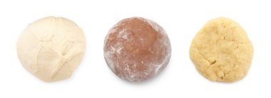 Different types of dough isolated on white, set. Top view