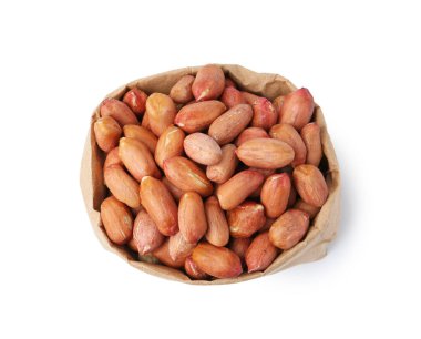 Fresh peanuts in paper bag isolated on white, top view