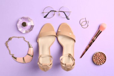 Shoes, perfume and stylish accessories on lilac background, flat lay