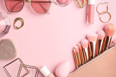 Frame of stylish accessories on pink background, flat lay. Space for text