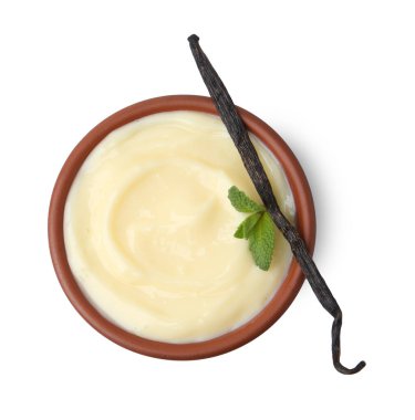 Tasty vanilla pudding, mint and pod isolated on white, top view