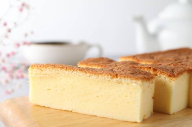 Tasty Japanese Castella sponge cake served on light table, closeup