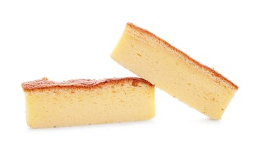 Pieces of tasty Japanese Castella sponge cake isolated on white