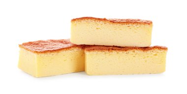 Pieces of tasty Japanese Castella sponge cake isolated on white