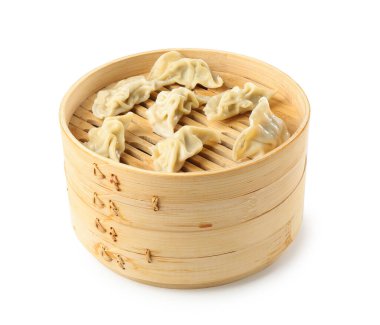 Bambu buharlı buharlı tencerede kaynamış gyoza (hamur tatlısı).