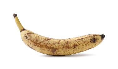 Olgun muz ve koyu lekeler beyazda izole.