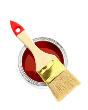 Can of red paint and brush isolated on white, top view
