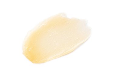 Sample of beige lip balm isolated on white, top view