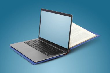 Renkli arka plan üzerine açık kitap ve dizüstü bilgisayar. E-öğrenme, internet kütüphanesi, çevrimiçi webinar