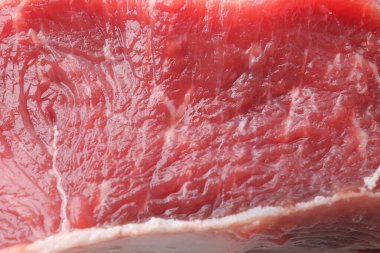 Raw beef meat as background, closeup view