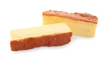 Pieces of tasty Japanese Castella sponge cake isolated on white