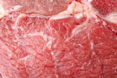 Raw beef meat as background, closeup view