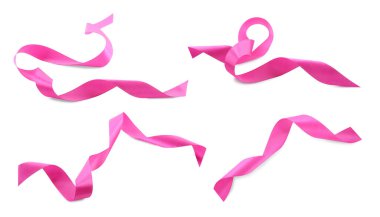 Güzel pembe kurdeleler beyaz sette izole edilmiş.