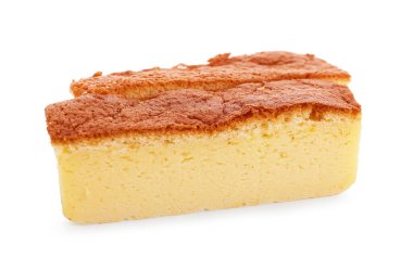 Pieces of tasty Japanese Castella sponge cake isolated on white