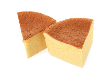 Pieces of tasty Japanese Castella sponge cake isolated on white