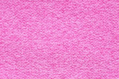 Arka plan olarak pembe örülmüş kumaşın dokusu, üst görünüm