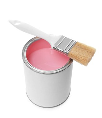 Can of pink paint and brush isolated on white