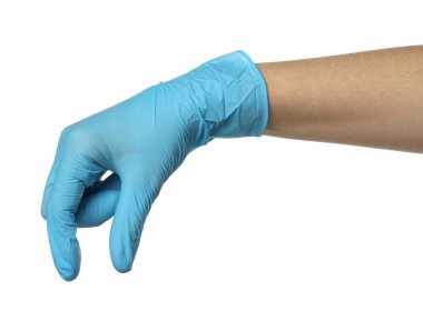 Tıbbi eldivenli doktor beyaz arka planda bir şey tutuyor.