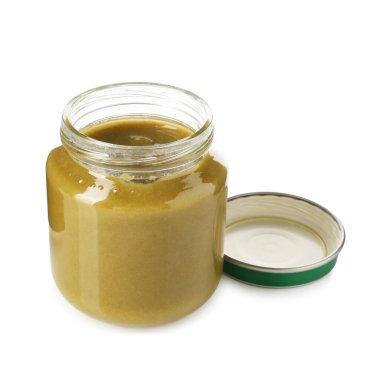 Bebek maması. Cam kavanozdaki lezzetli püre beyaza izole edilmiş.