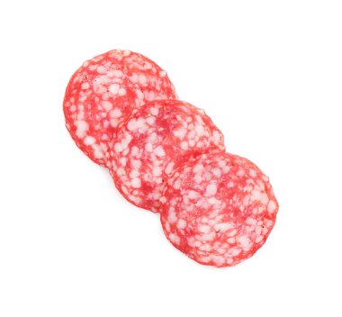Slices of tasty smoked sausage on white background, top view