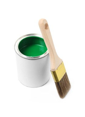Can of green paint and brush isolated on white