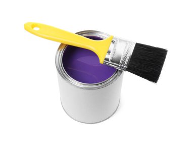 Can of purple paint and brush isolated on white