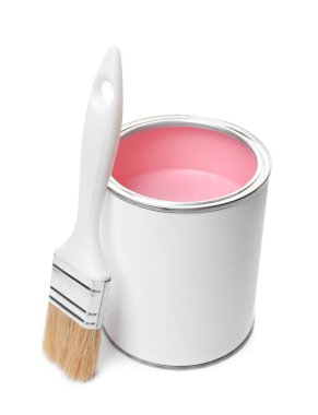Can of pink paint and brush isolated on white