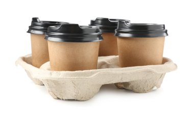 Paper coffee cups in cardboard holder isolated on white