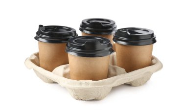Paper coffee cups in cardboard holder isolated on white