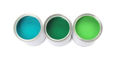 Cans of different paints isolated on white, top view